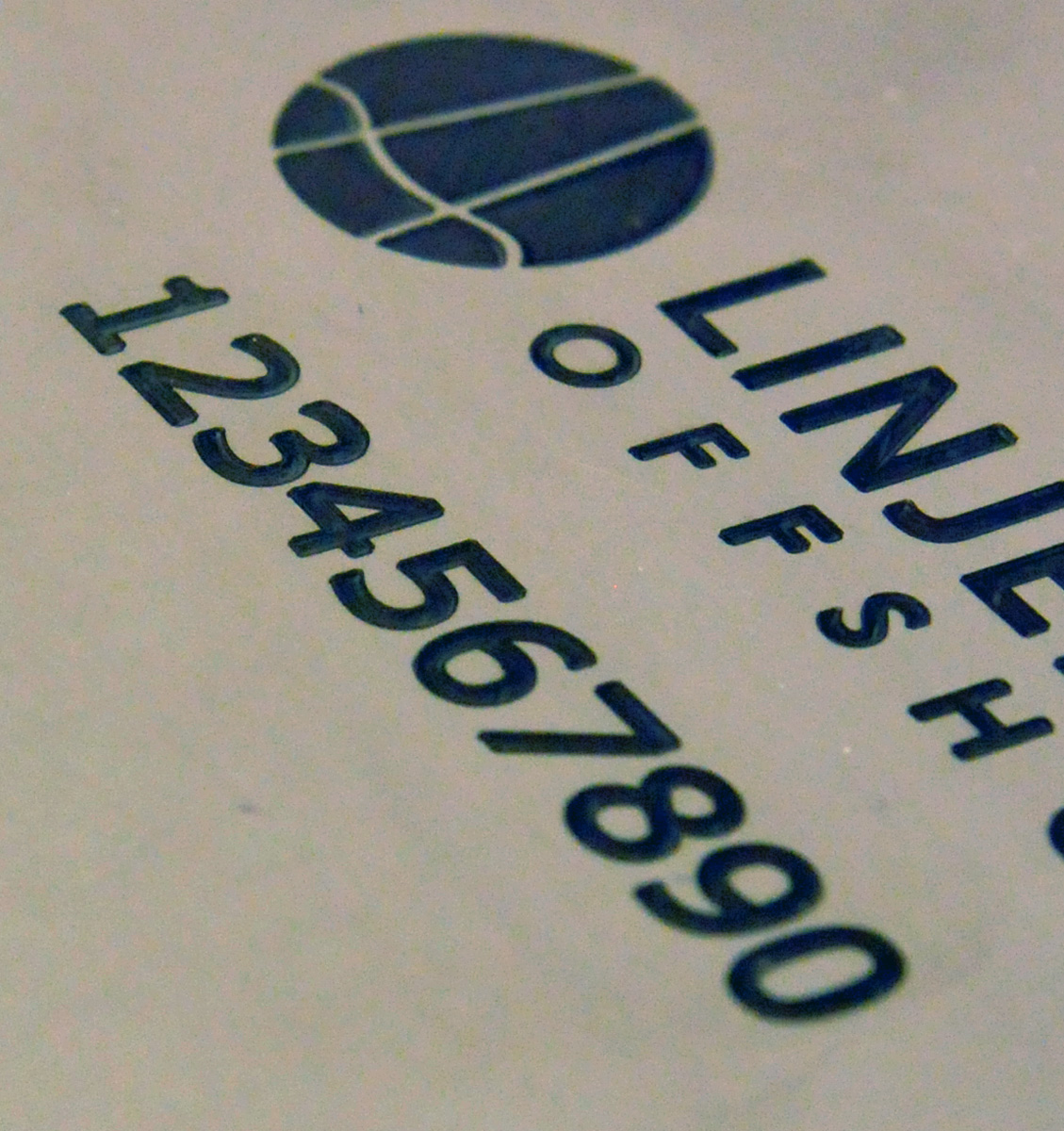 Lasergravert merke på metall